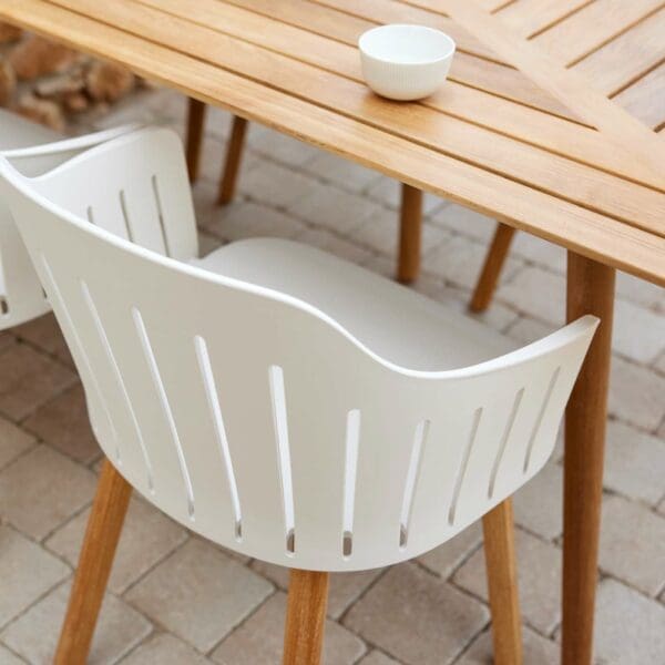 Image showing detail of Define table' geometric teak top, together with Choice recycled plastic garden chair