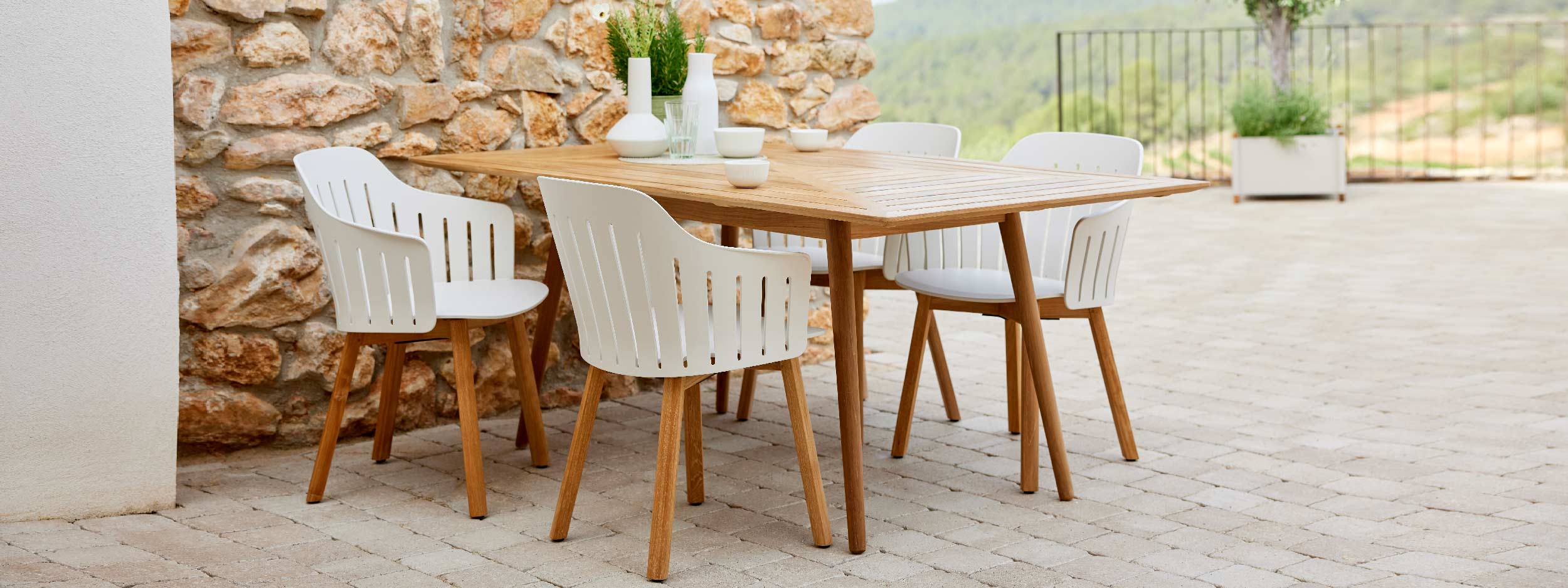 Image of Cane-line Define teak table with Choice contemporary garden chairs