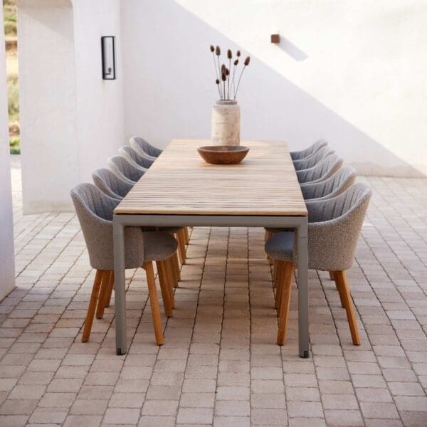 Image of Drop extending garden dining table, with Choice chairs either side