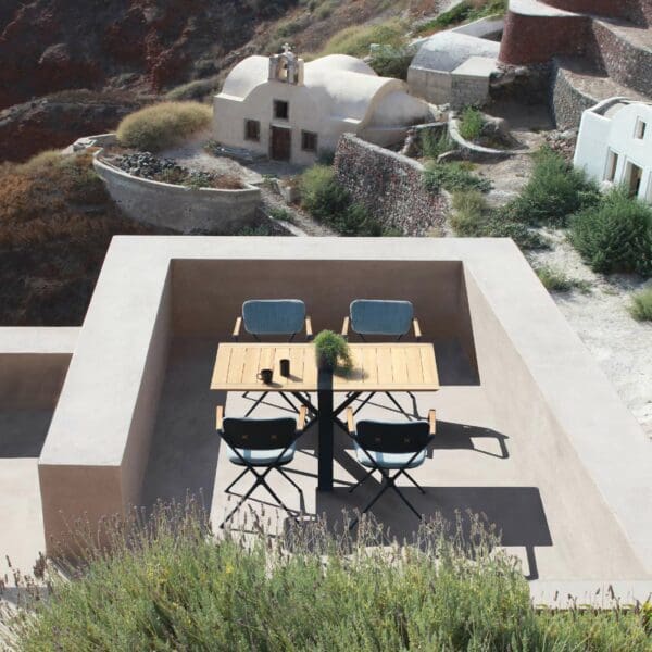 Image of Royal Botania Exes modern garden chairs and Traverse rectangular folding dining table on sunny terrace