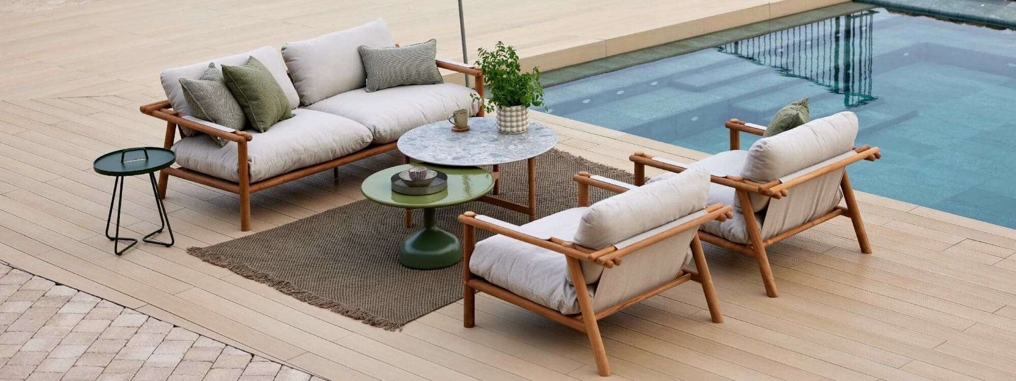 Image of Glaze modern garden low tables with Sticks teak lounge furniture by Cane-line