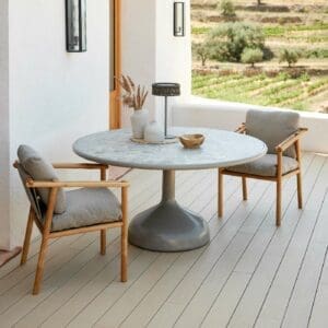 Image of Glaze modern garden dinner table with Sticks teak armchairs by Cane-line
