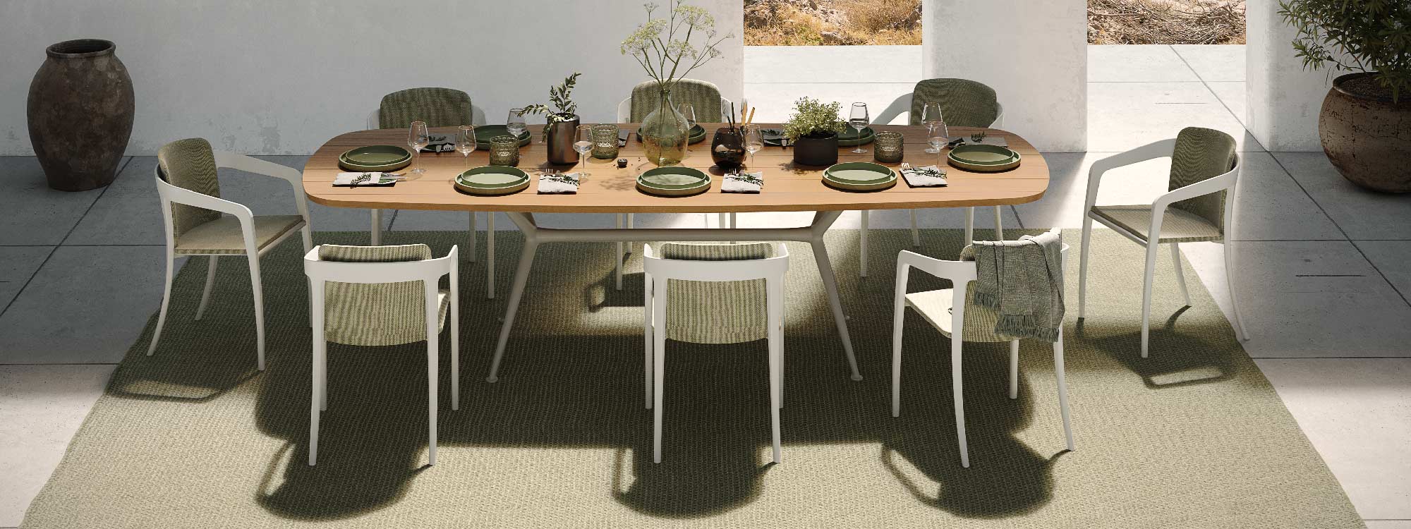 Image of Styletto white oval garden table with teak top, together with Jive white modern garden chairs by Royal Botania