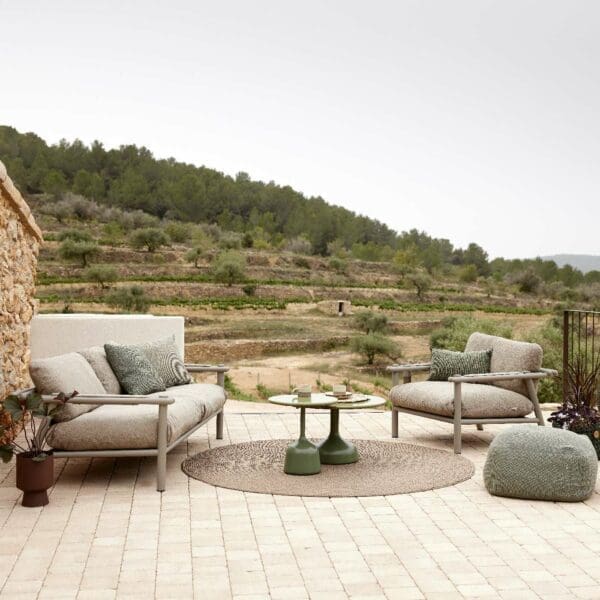 Image of Cane-line Knit garden carpet with Glaze coffee tables and Sticks outdoor lounge furniture