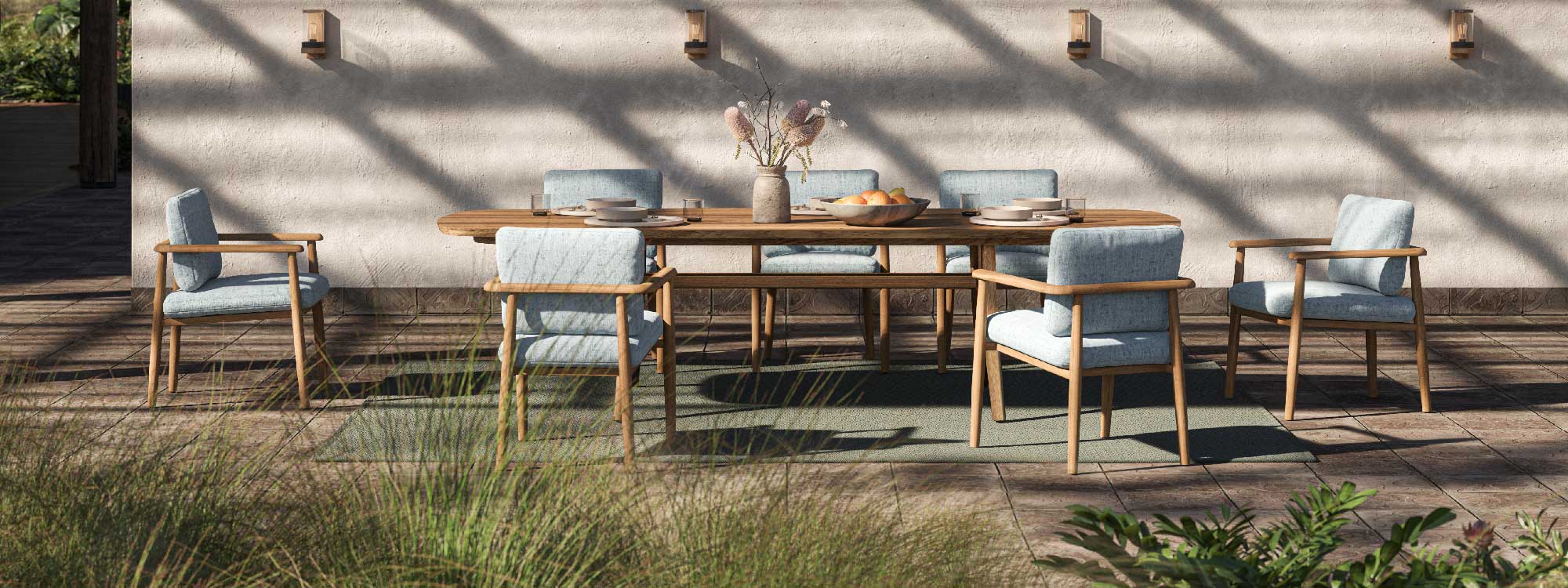 Image of Mambo teak garden dining chairs and Zidiz teak table by Royal Botania