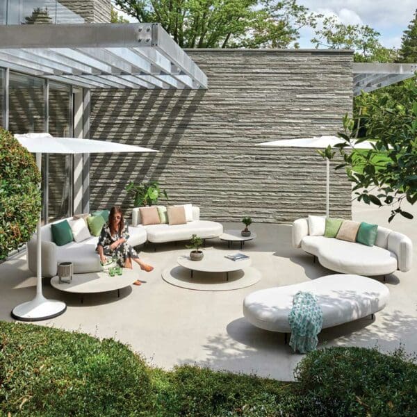 Image of circular arrangement of Organix amorphous garden sofas and daybeds on sunny terrace