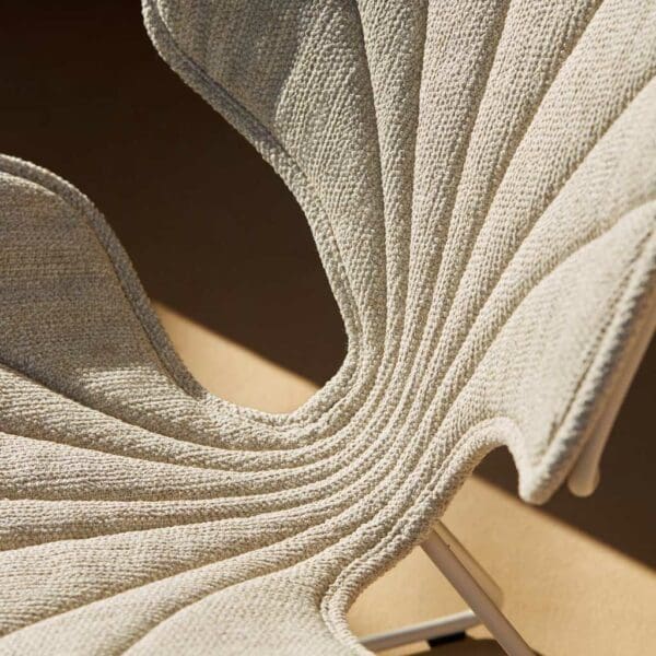 Image of detail of Royal Botania Ostrea low chair's scalloped seat and back cushion