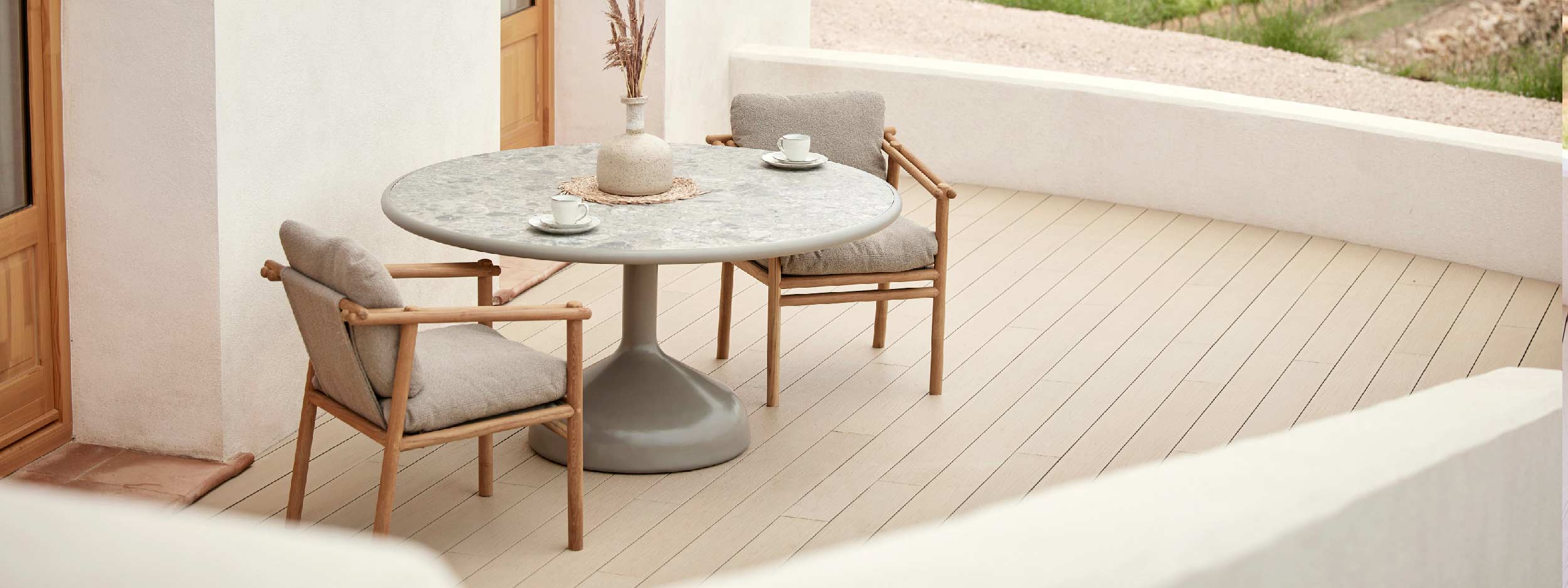 Image of Sticks teak garden chairs and Glaze round ceramic dining table