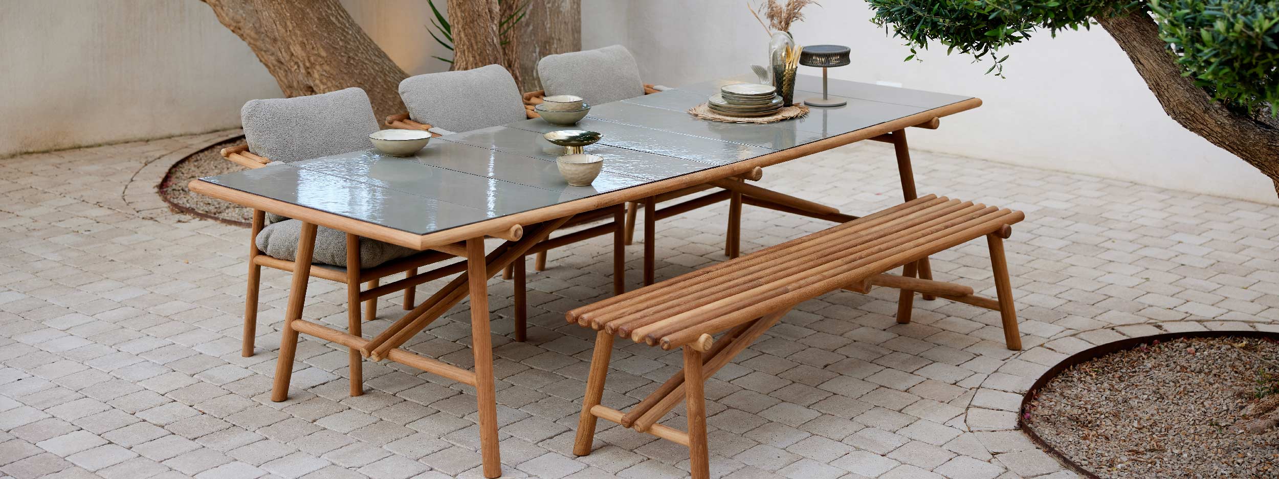 Image of Sticks teak garden dining set with bench seat