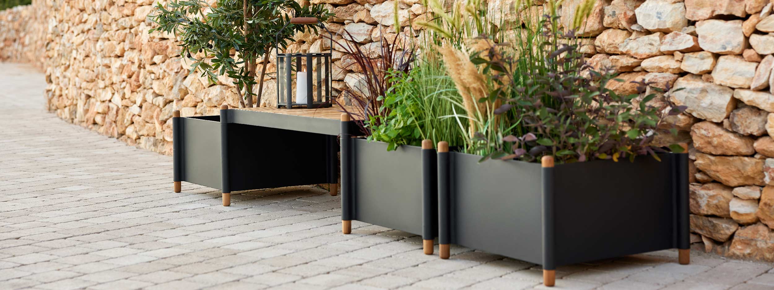 Image of Cane-line Sticks planter & bench system, in Lava-Grey powder coated aluminium and FSC certified teak