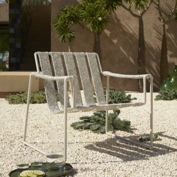 Image of low-backed Strappy white garden lounge chair with grey upholstered straps