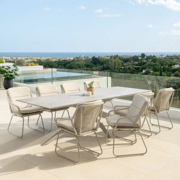 Image of Yate rectangular pedestal table and Alden taupe garden dining chairs by Jati & Kebon