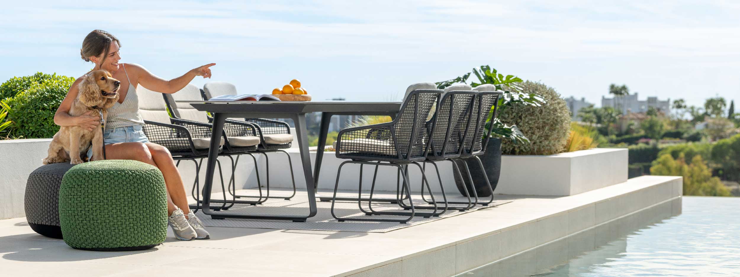 Image of Elko charcoal coloured garden table and Alden aluminium & rope garden chairs by Jati & Kebon