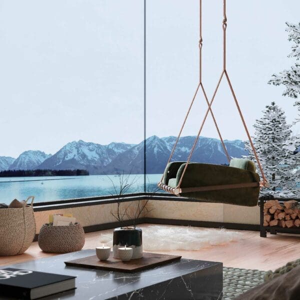 Image of Fable modern hanging chair in minimalist dwelling, with mountains and lake in the background