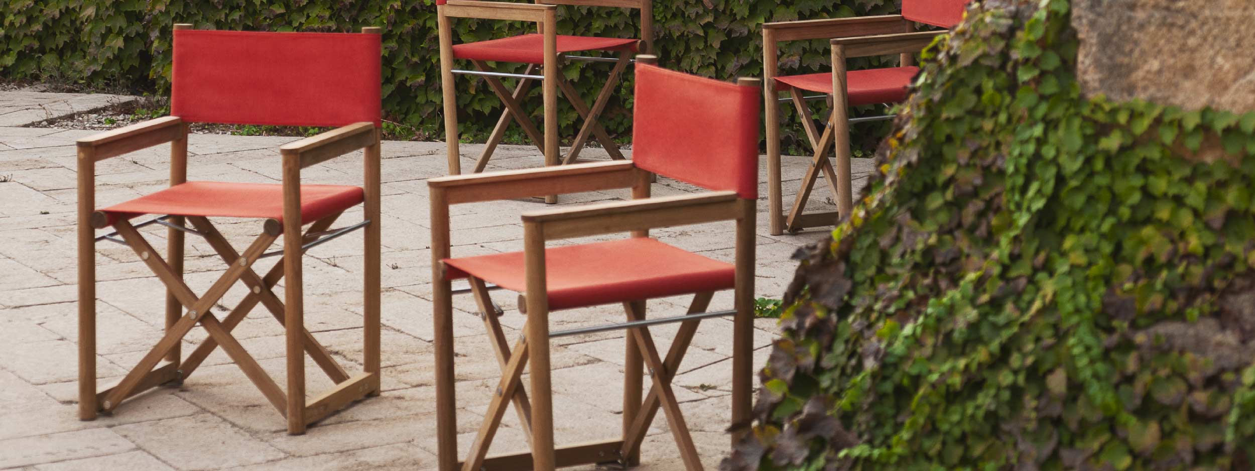 Image of Orson luxury director chairs in Ginger coloured Batyline fabric & teak by RODA, Italy.