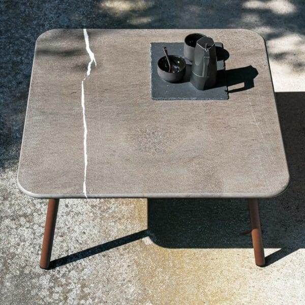 Image showing the natural detail of Piper low table's stone table top by RODA