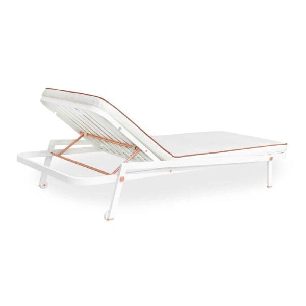 Studio image of Ribbon sun lounger showing gold plated stainless steel fixtures & fittings on the lounger's white aluminium frame