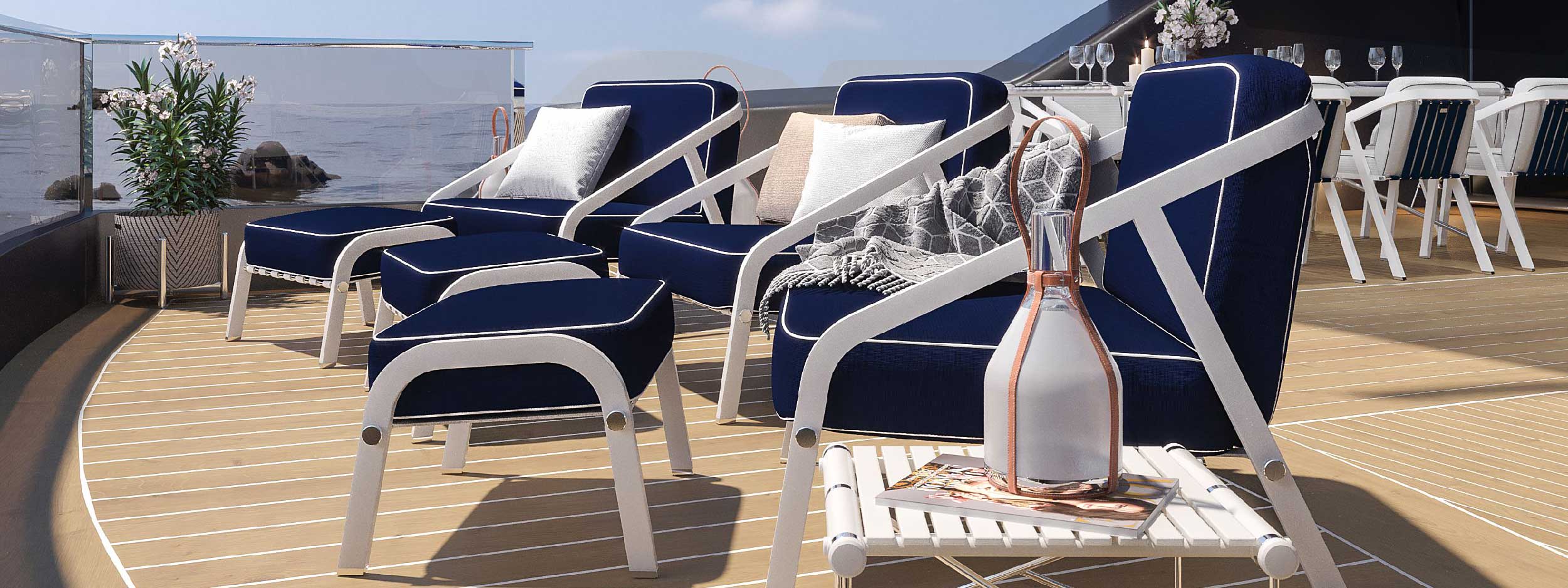 Image of Ribbon lounge chairs with white aluminium frames and navy blue cushions with white piping