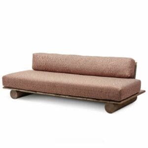 Studio image of Gommaire Edge garden sofa with rose-colour cushions
