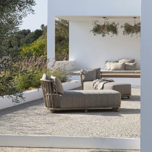 Image of Gommaire chaise longue Carol on sunny terrace with whitewashed building in the background