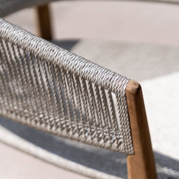 Image of detail of the skillfully hand-woven polyester cord over the teak frame of Cares garden chair by Royal Botania