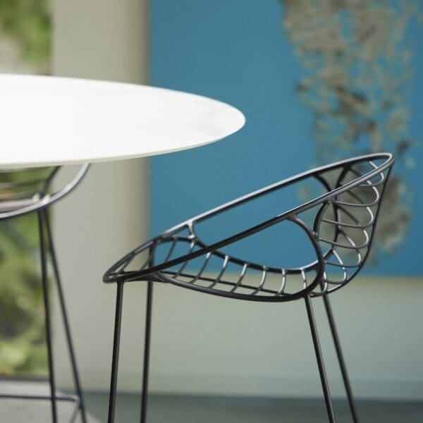 Image of Wire modern steel bar stool and Wire ceramic bar table by Joli