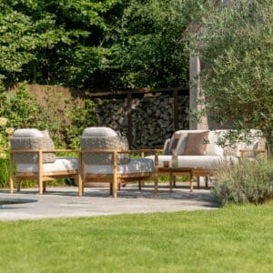 Image of Jati & Kebon Boho teak garden lounge set with trees in the background