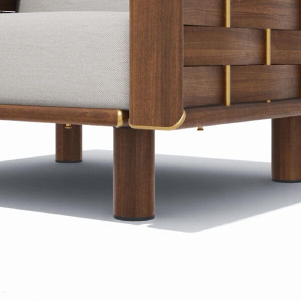 Studio image of detail of woven louvres of Tuuci Luma opulent garden lounge chair in Aluma-Teak aluminium