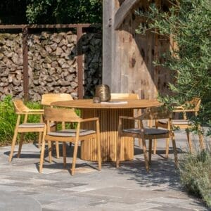 Image of Amato round teak dining table and Tofino chairs by Jati & Kebon
