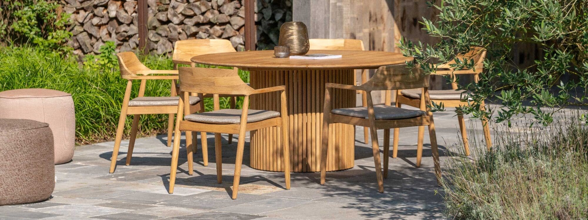 Image of Amato circular teak table and Tofino chairs by Jati & Kebon