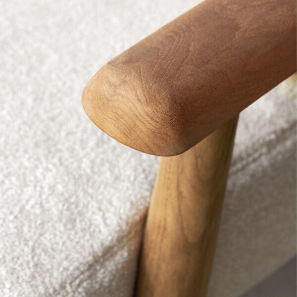Image of detail of Royal Botania Mambo Lounge teak arm and luxury cushions