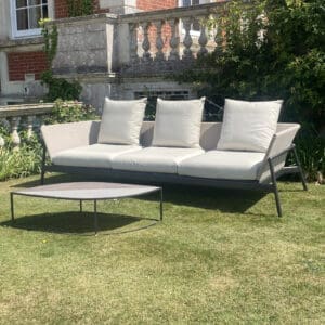 Image of Roda Piper sofa and Leaf low table outside Stansted House
