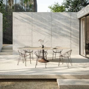 Image of Central Elyps Big luxury ceramic table and Wire chairs by Joli