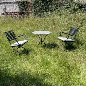 Image of Anton Damen garden table & folding chairs in long grass