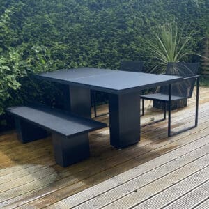 Image of ex-display FueraDentro Doble table, bench and dining chairs in black finish