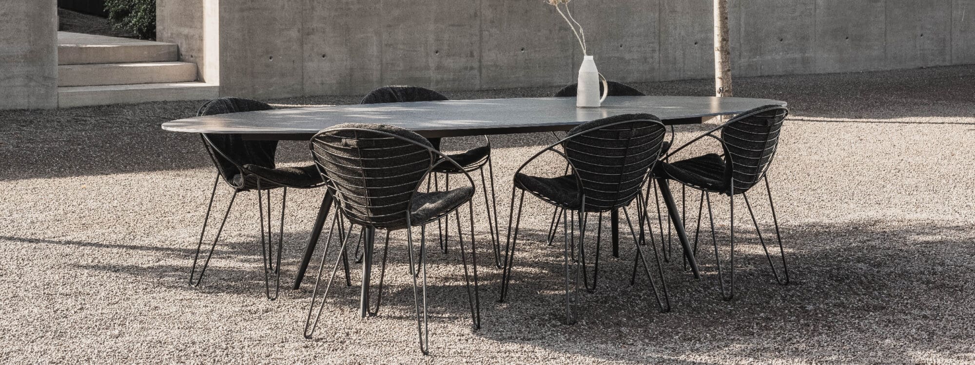 Image of Joli Marguerite dining table and Wire chairs