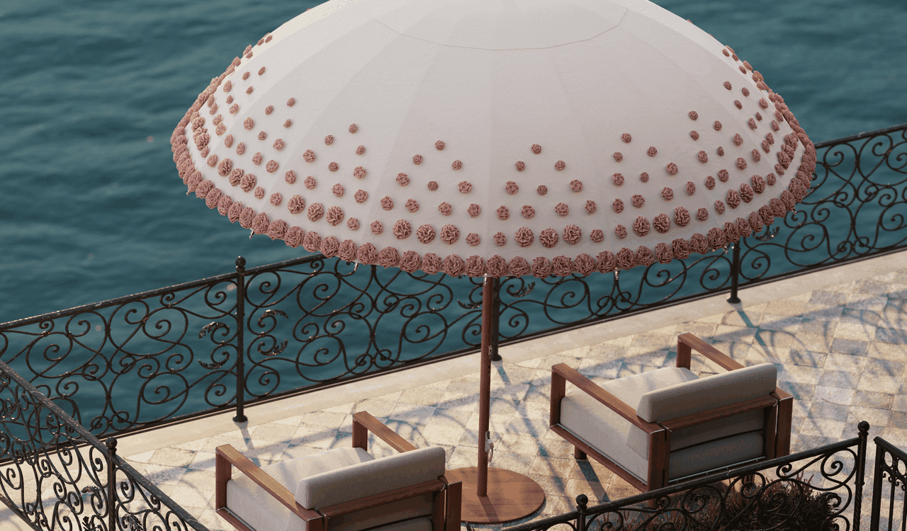 Image of Tuuci Image of the hand-made blossoms on the canopy of Tuuci Ombré Blossom luxury parasol above Tuuci Sail exterior lounge furniture