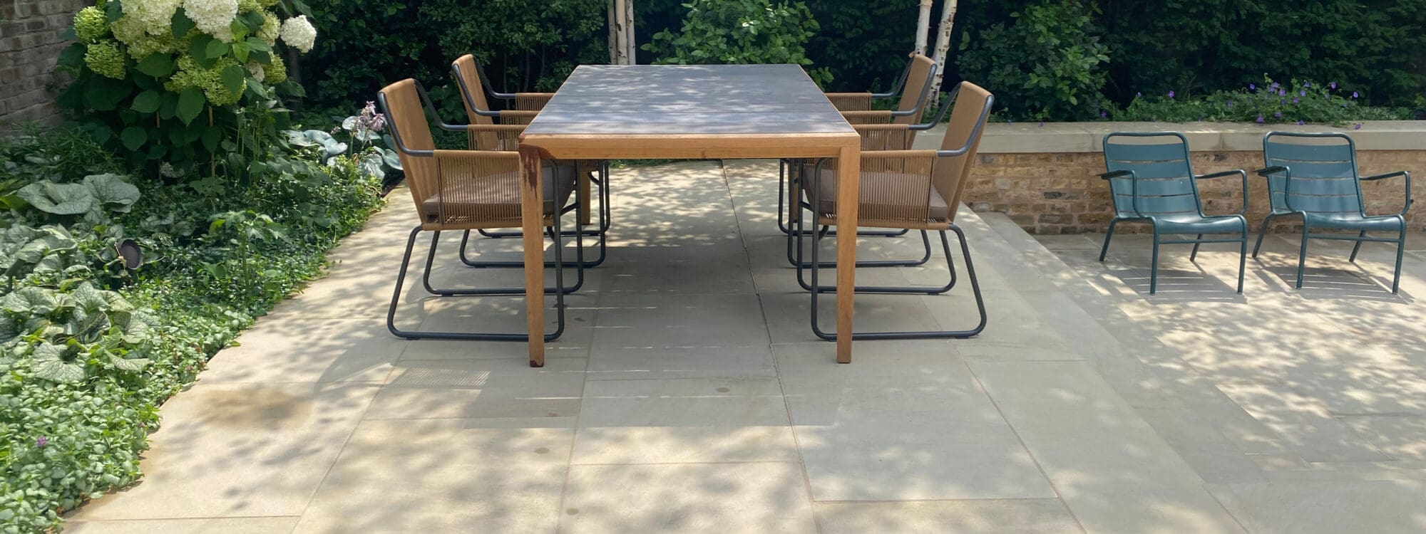 ex display roda table and 4 chairs in london garden
