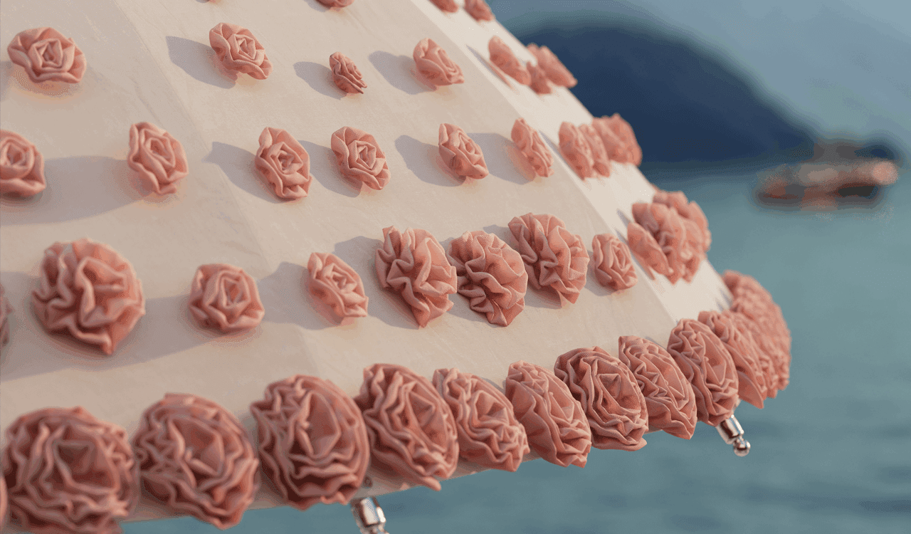 Image of the hand-made blossoms on the canopy of Tuuci Ombré Blossom luxury parasol