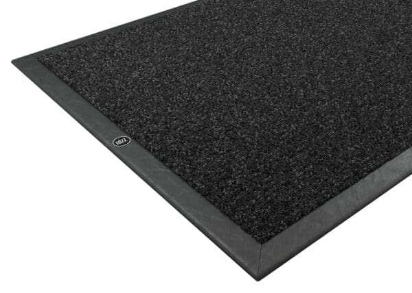 Studio image of RiZZ modern indoor door mat with anthracite leather border