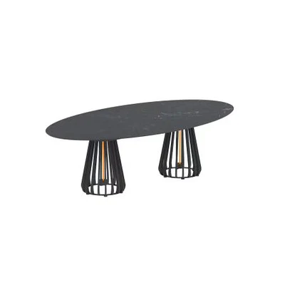 Studio image of small ellipse Furniz heated garden dining table by Royal Botania