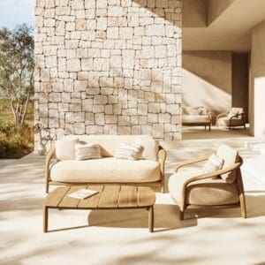 Image of Fusta luxury teak lounge furniture by Vondom in light and shade of terrace