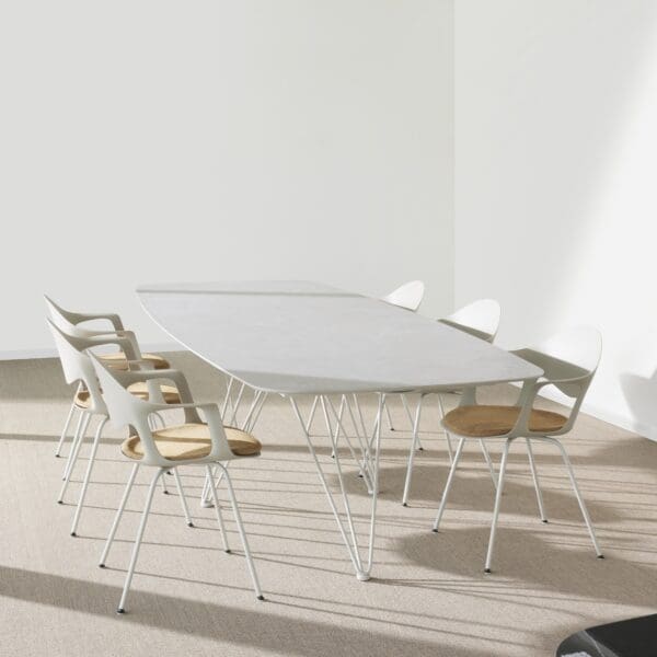 Image of Wire modern dining table with faux ellipse ceramic top by Joli