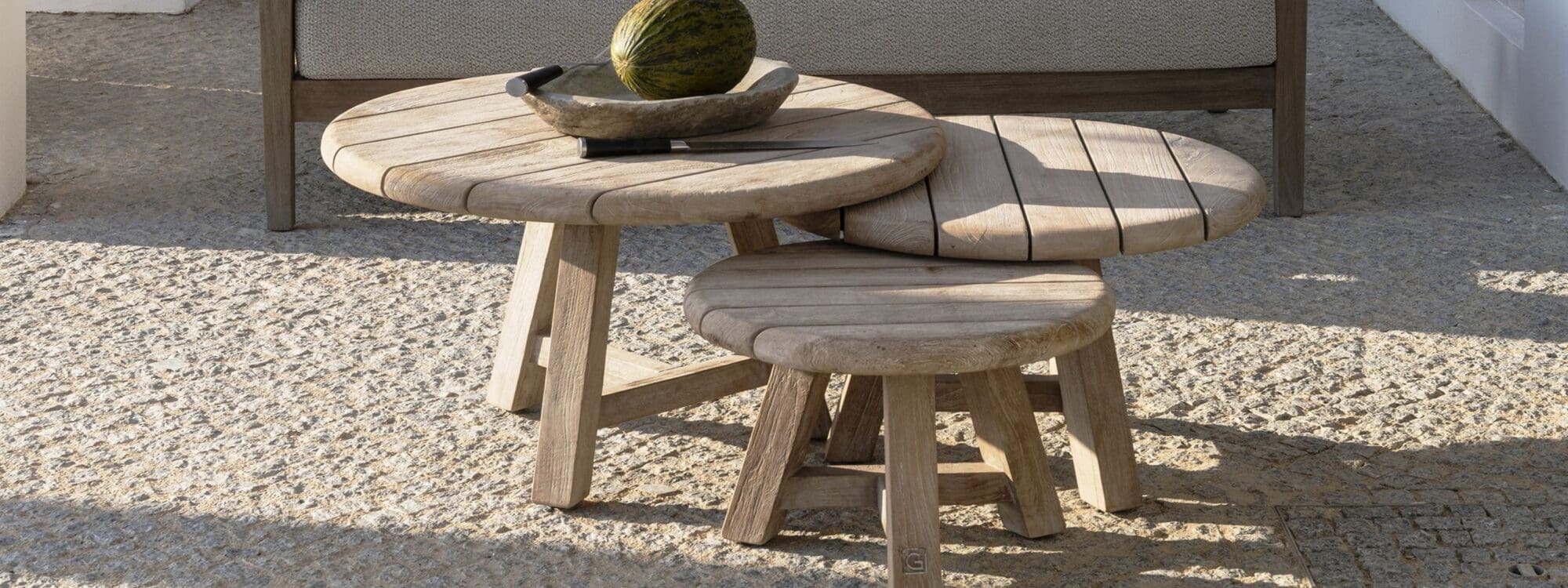 Image of set of 3 Anton round teak coffee tables in natural grey finish by Gommaire