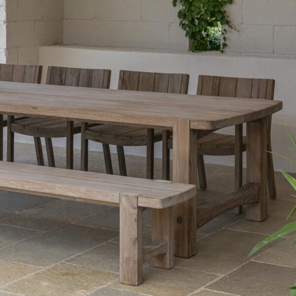Image of Gommaire Mario Mario teak dining chairs together with Jacoba linear teak table and Jacoba large bench seat