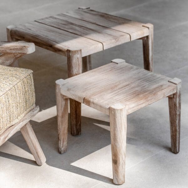 Image of pair of Gommaire Floor square teak coffee tables next to Alabama contemporary teak lounge furniture