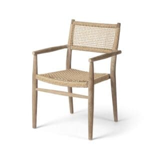 Studio image of Gommaire Mieke stackable armchair in natural grey teak and sand-coloured wicker.