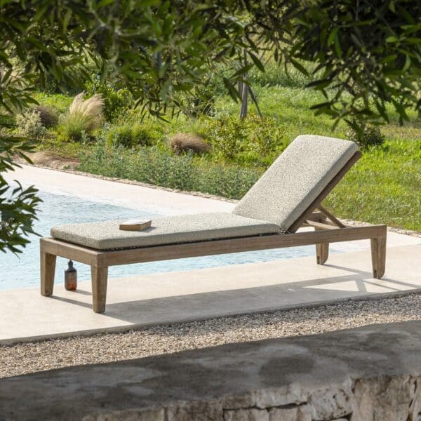 Image of Gommaire Lisa teak sunlounger on sunny poolside