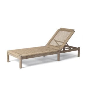 Studio image of Gommaire Mieke luxury teak sun lounger with PE wicker seat and back