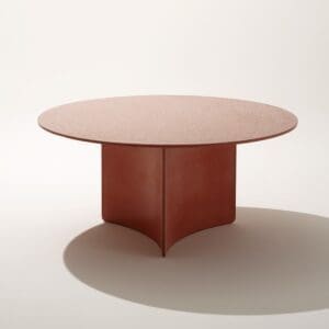 Image of Roda Aspic circular garden dining table in poured orange concrete